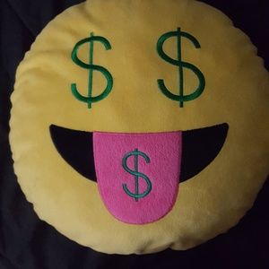 An emoji pillow
